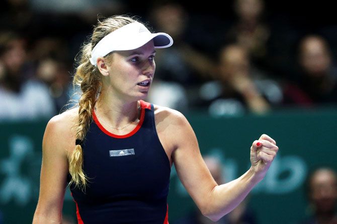 Caroline Wozniacki says: 'I didn't want to talk about it during the year because I don't want to give anyone the edge, thinking I'm not feeling well. You learn how to just cope after matches'