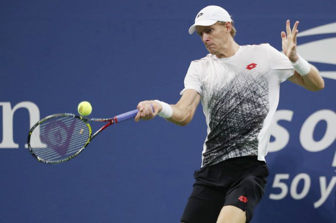 South Africa's Kevin Anderson hits a forehand against Canada's Denis Shapovalov in the third round match at USTA Billie Jean King National Tennis Center