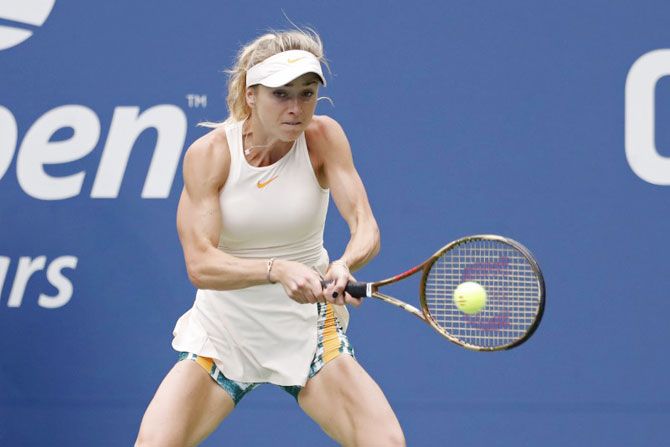Ukraine's Elina Svitolina hits a backhand against China's Qiang Wang in the third round match