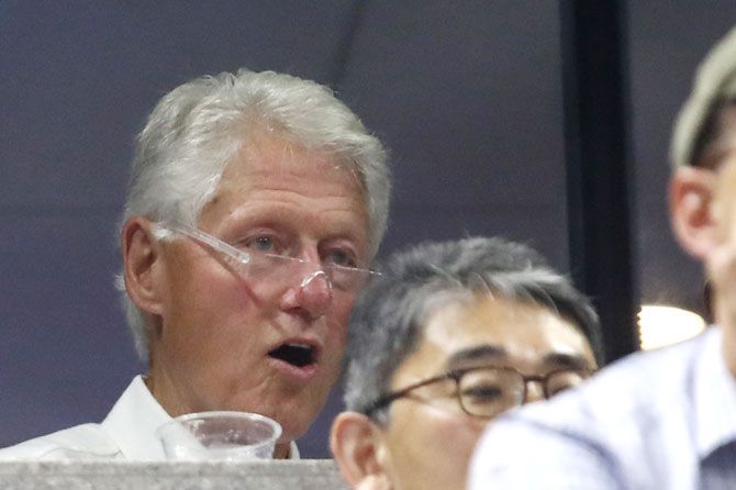 Bill Clinton watches in shock as the proceedings unfold at the USTA Billie Jean King National Tennis Center in New York