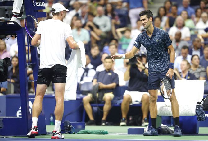 John Millman requests Novak Djokovic to allow him an unscheduled ten minute break during the second set of their men's singles quarter-final on Wednesday
