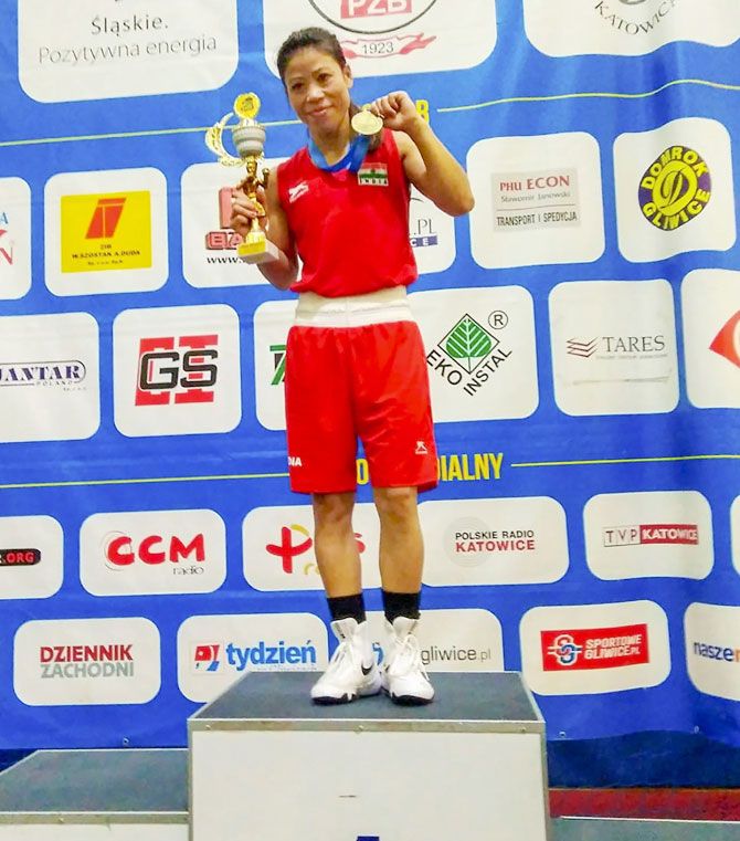 Boxing champion M C Mary Kom on the podium after winning gold in 48kg event during the 13th Silesian Open Boxing Tournament for women in Gliwice, Poland, on Sunday