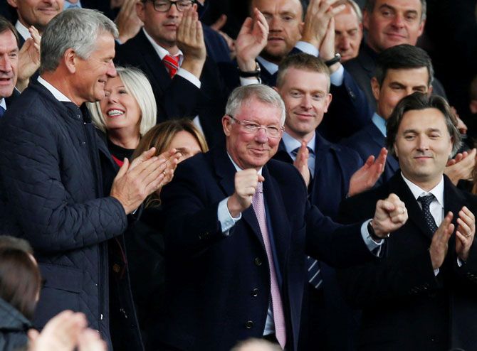 Sir Alex Ferguson and FIFA Council vice-president David Gill in the stands before the English Premier League match between Manchester United and Wolverhampton Wanderers at Old Trafford on Saturday