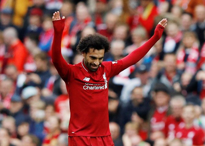 Liverpool's Mohamed Salah celebrates on scoring their third goal against Southampton on Saturday