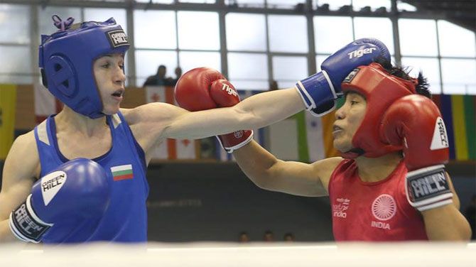 India's Meena Kumari Maisnam (left) won gold in the 54kg category at the Cologne World Cup