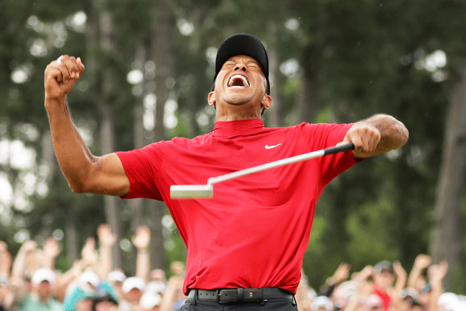 USA's Tiger Woods celebrates on the 18th hole to win the 2019 Augusta Masters in Georgia, USA on Sunday, April 14