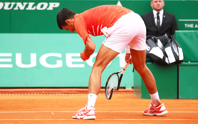 Serbia's Novak Djokovic smashes his racket in anger during his second round match against Germany's Philipp Kohlschreiber at the Rolex Monte-Carlo Masters at Monte-Carlo Country Club in Monte-Carlo, Monaco, on Tuesday