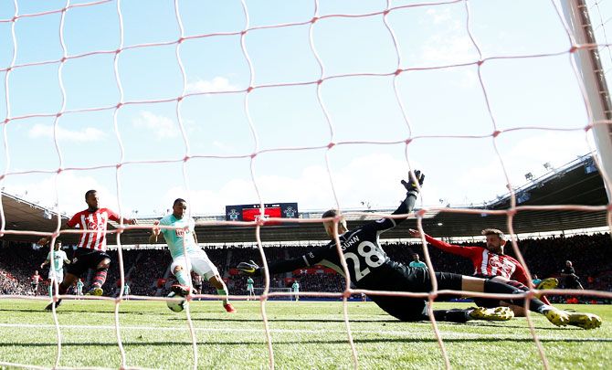 Bournemouth's Callum Wilson scores their third goal against Southampton at St Mary's Stadium, Southampton