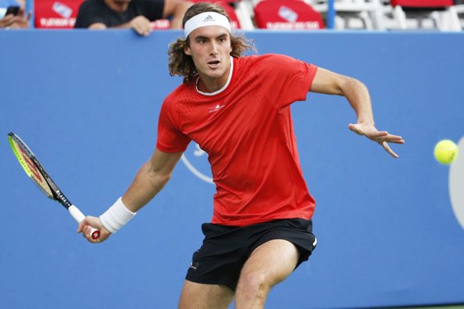 Stefanos Tsitsipas of Greece hits a forehand against Benoit Paire of France during their men's singles quarter-final of the 2019 Citi Open at William H.G. FitzGerald Tennis Center in Washington DC on Friday