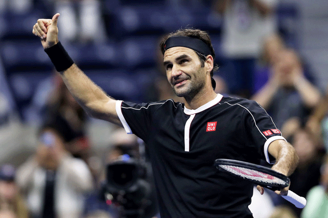 Roger Federer celebrates after defeating India's Sumit Nagal in their first round match on day one of the 2019 US Open at the USTA Billie Jean King National Tennis Center at Flushing meadows of the Queens borough of New York City in New York on Monday