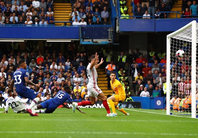 Kurt Zouma of Chelsea scores an own goal for Sheffield United's second goal 