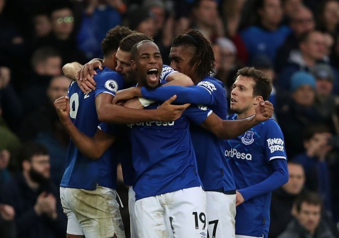 Everton's Djibril Sidibe and teammates celebrate after the match against Chelsea at Goodison Park in Liverpool on Saturday
