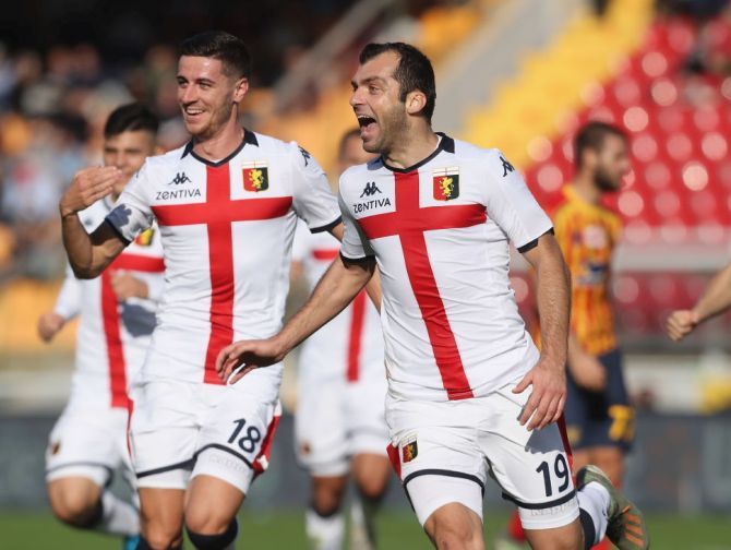 Genoa's Goran Pandev (right) celebrates after scoring his team's opening goal during their Serie A match against US Lecce at Stadio Via del Mare in Lecce, Italy, on Sunday