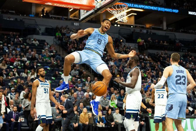 Memphis Grizzlies forward Bruno Caboclo (5) dunks the ball during the third quarter of their NBA match against the Minnesota Timberwolves at Target Center in Minneapolis, Minnesota, on Sunday, December 1.