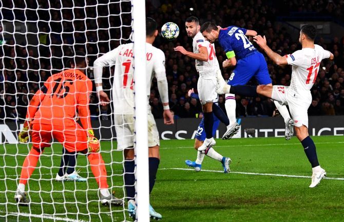 Chelsea's Cesar Azpilicueta heads to net their second goal against Lille during their Champions League Group H match at Stamford Bridge in London 