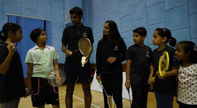 India's badminton coach Pullela Gopichand and former champion Aparna Popat at a badminton clinic for children during the official launch of the Badminton Gurukul at MCA Club in BKC, Mumbai on Thursday