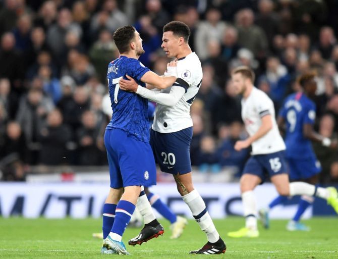 Chelsea's Mateo Kovacic clashes with Tottenham Hotspur's Dele Alli