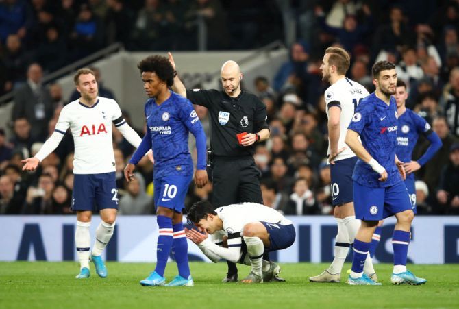 Tottenham Hotspur's Heung-Min Son is shown a red card by referee Anthony Taylor 