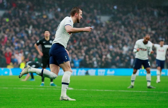 Tottenham Hotspur's Harry Kane celebrates scoring their first goal against Brighton & Hove Albion at the Tottenham Hotspur Stadium in London on Thursday