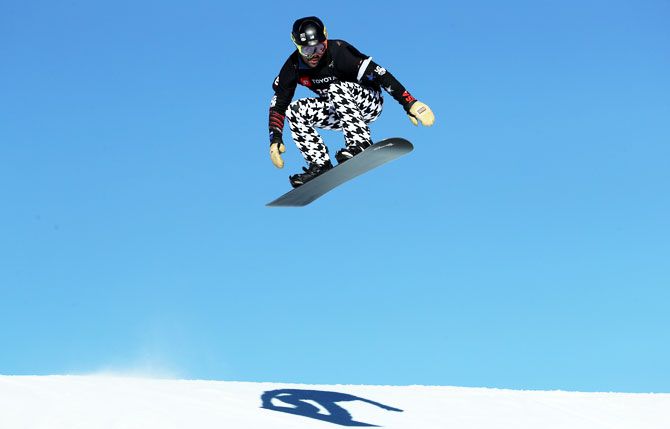 Czech Republic's Radek Vintr competes during the Men's Snowboard Cross Qualifier on Thursday