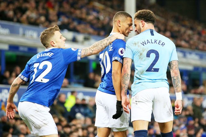 Manchester City's Kyle Walker and Everton's Richarlison clash
