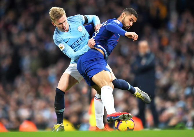 Chelsea's Ruben Loftus-Cheek is challenged by Manchester City's Oleksandr Zinchenko