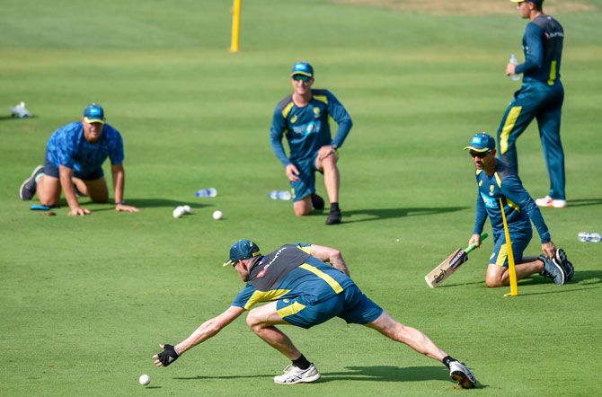 Australia players with coach Justin Langer and former Australian player Matthew Hayden at a practice session ahead of their first T20 international series against India, at the Dr. YS Rajasekhara Reddy ACA–VDCA Cricket Stadium in Vizag on Saturday