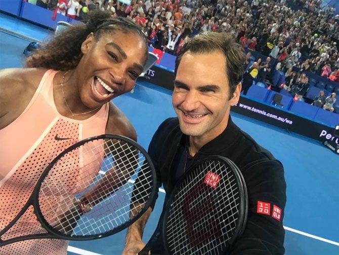 Roger Federer clicks a selfie with Serena Williams after their historic Hopman Cup match on Tuesday