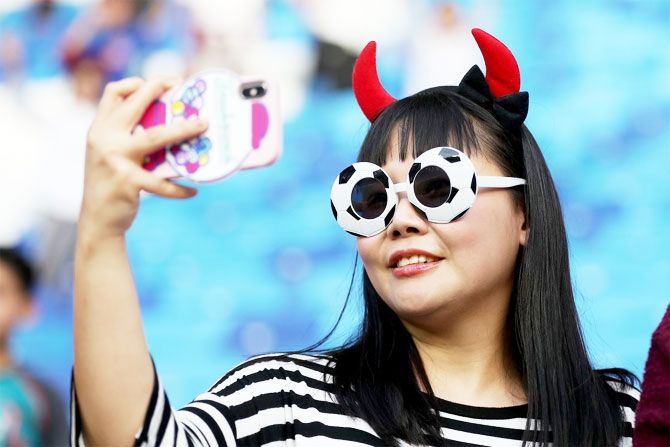 A South Korea fans clicks a selfie 