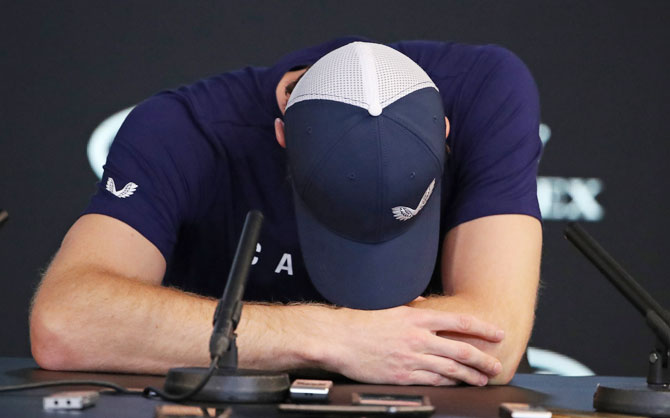 Andy Murray breaks down during the press conference