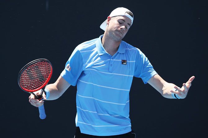 USA's John Isner did have answers to compatriot Reilly Opelka in their first round match