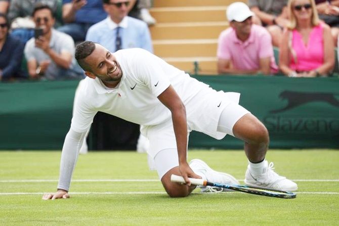  Nick Kyrgios reacts after taking a tumble during his first round match against Jordan Thompson.