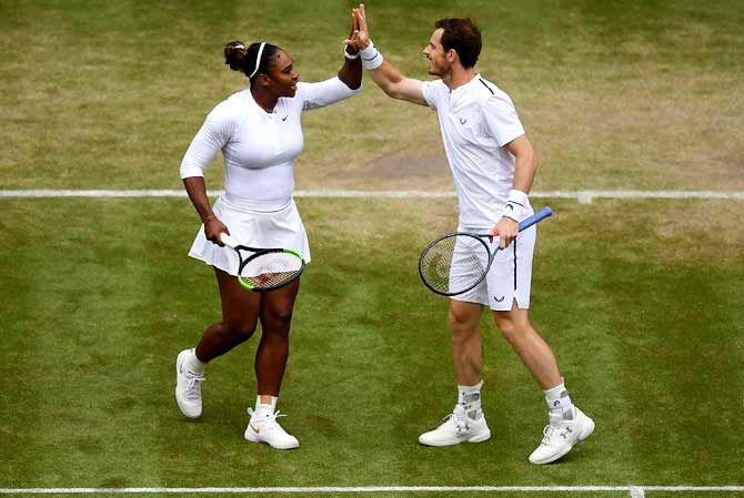 Serena Williams and Andy Murray celebrate winning a point