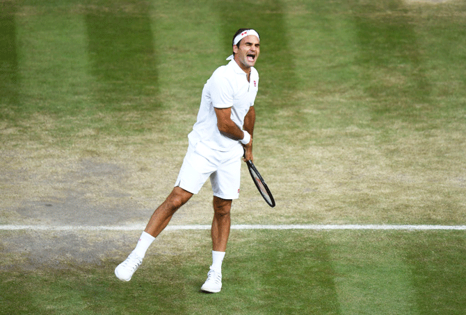 Switzerland's Roger Federer celebrates match point after defeating Spain's Rafael Nadal