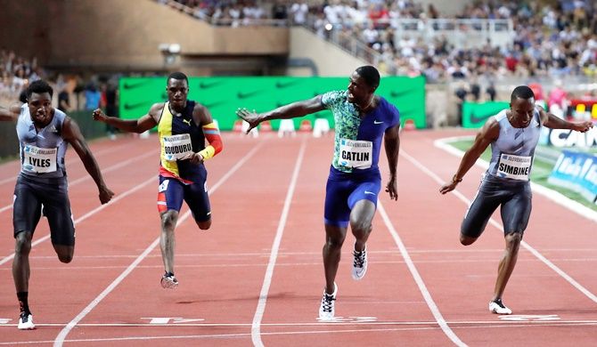 Justin Gatlin of the United States wins the men's 100 metres.