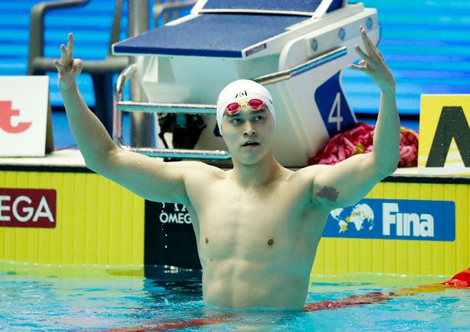 China's Sun Yang celebrates winning the Men's 400m Freestyle Final of the 18th FINA World Swimming Championships at Nambu University Municipal Aquatics Center in Gwangju, South Korea, on Sunday