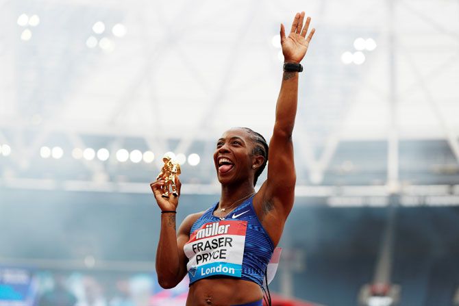 Jamaica's Shelly-Ann Fraser-Pryce poses as she celebrates winning the Women's 100m race in the Diamond League, London Anniversary Games at London Stadium on Sunday 