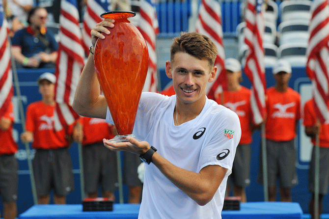 Australia's Alex De Minaur with the trophy after defeating American Taylor Fritz in the final of the BB&T Atlanta Open at Atlantic Station in Atlanta, Georgia, on Sunday