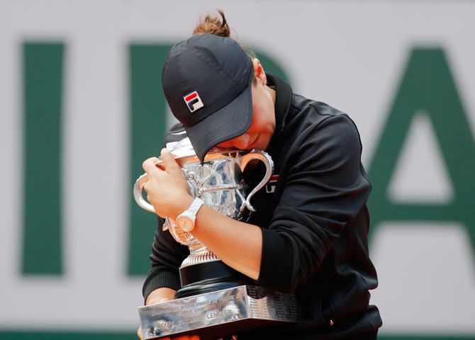 Ashleigh Barty with her cherished prize