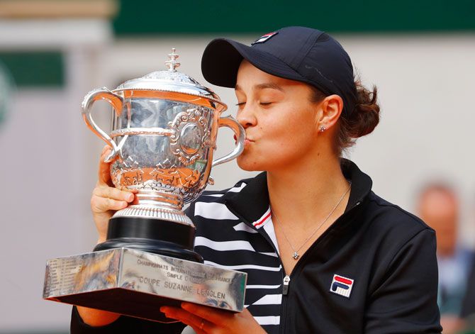 Australia's Ashleigh Barty celebrates with the trophy after winning the women's French Open final against Czech Republic's Marketa Vondrousova on Saturday
