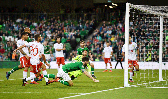 Republic of Ireland's Robbie Brady scores their second goal against Gibraltar during their Group D match at Aviva Stadium in Dublin on Monday