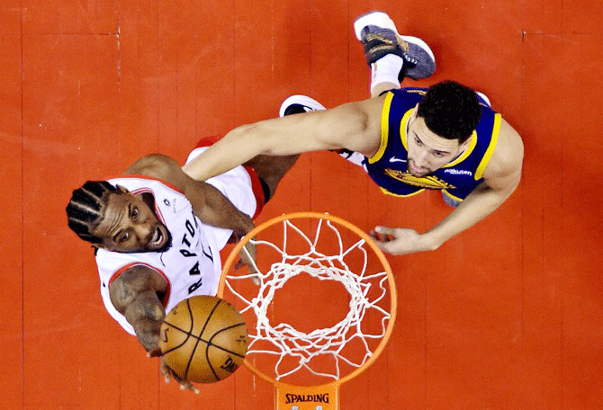 Toronto Raptors forward Kawhi Leonard (2) shoots the ball against Golden State Warriors guard Klay Thompson (11) in game five of the 2019 NBA Finals at Scotiabank Arena in Toronto on Monday