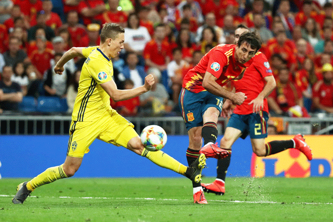 Mikel Oyarzabal scores their third goal in their Group F match Sweden at Santiago Bernabeu, Madrid, on Monday 
