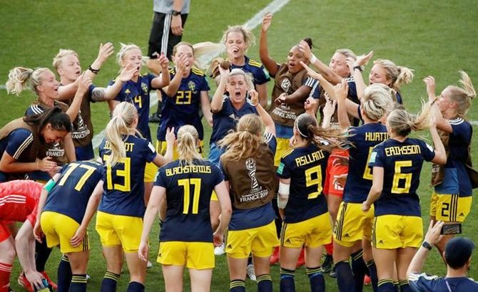  Sweden's players celebrate after defeating Germany in the women's World Cup quarter-finals