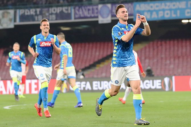 SSC Napoli's Fabian Ruiz celebrates after scoring against Red Bull Salzburg during their UEFA Europa League Round of 16 First Leg match at Stadio San Paolo in Naples, Italy