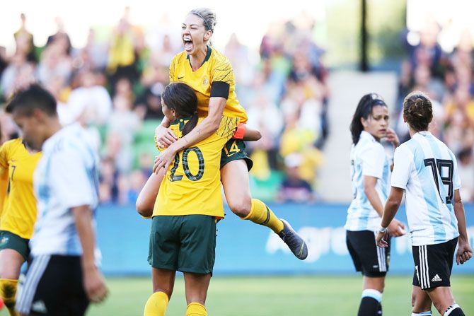 The Matildas' Alanna Kennedy celebrates a goal with teammate Sam Kerr during the Cup of Nations match between Australia and Argentina at AAMI Park in Melbourne, Australia, on Wednesday, March 06