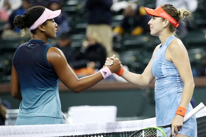 Japan's Naomi Osaka congratulates Switzerland's Belinda Bencic after her 6-3, 6-1 loss in their women's singles fourth round match