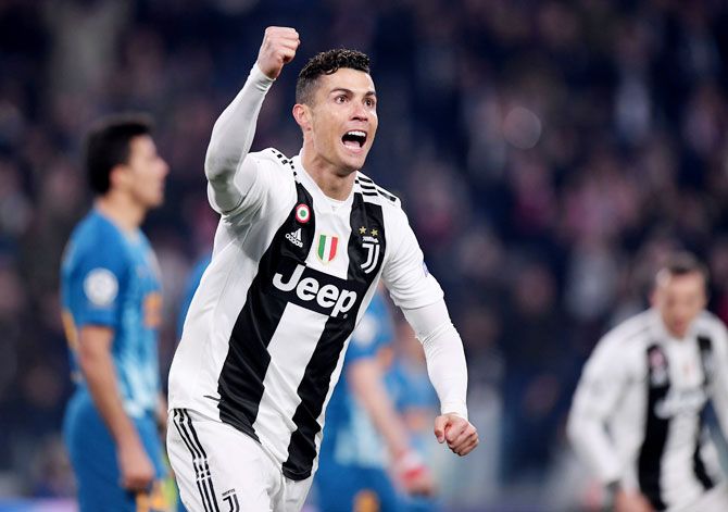 Juventus' Cristiano Ronaldo celebrates scoring their second goal against Atletico Madrid during their Champions League - Round of 16 Second Leg match at Allianz Stadium in Turin