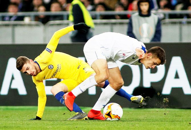 Chelsea's Jorginho (left) and Dynamo Kiev's Volodymyr Shepeliev vie for possession during their Europa League, round of 16, second leg match at NSC Olympiyskiy, Kiev, Ukraine
