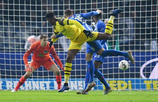 Borussia Dortmund's Dan-Axel Zagadou scores their second goal against Hertha Berlin in their Bundesliga match at Olympiastadion in Berlin on Saturday